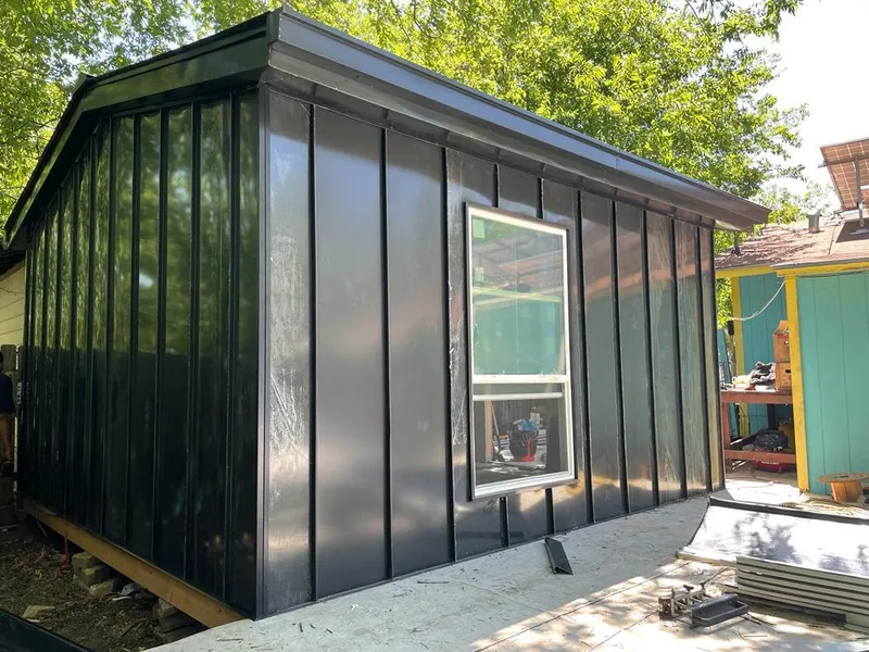 Black standing seam metal wall panels for Metal Roof Installation in Homer