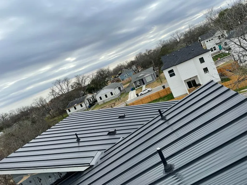Standing seam metal roof panels with vents for Skylight Repair in Homer